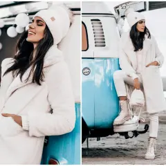 Kobieta w białym, puchatym płaszczu i czapce prezentuje stylowe stylizacje zimowe damskie na tle turkusowego kampera.