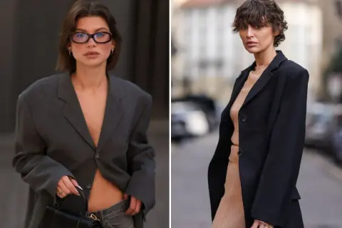 Dwie kobiety prezentują krótkie fryzury damskie bez układania. Jedna w szarym oversize'owym blazerze, druga w czarnym płaszczu.