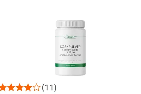Biały pojemnik z zielonym logo Nakobe, zawierający proszek SCS-PULVER Sodium Coco Sulfate.