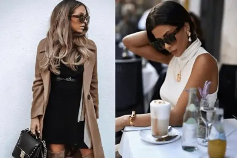 Elegancka stylizacja do restauracji: płaszcz, czarna sukienka i torebka. Druga kobieta w białej bluzce z golfem, przy stoliku z kawą.
