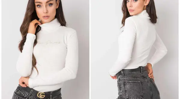 Biały golf damski z napisem "Rue Paris" i jeansy tworzą stylową, casualową stylizację.