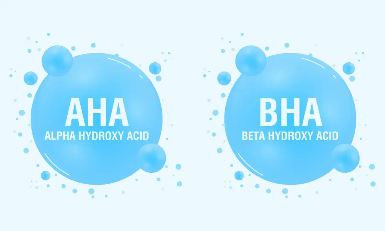 Dwa bąbelki z napisami AHA (Alpha Hydroxy Acid) i BHA (Beta Hydroxy Acid). Dowiedz się, kwasy AHA/BHA z czym nie łączyć, by uniknąć podrażnień.