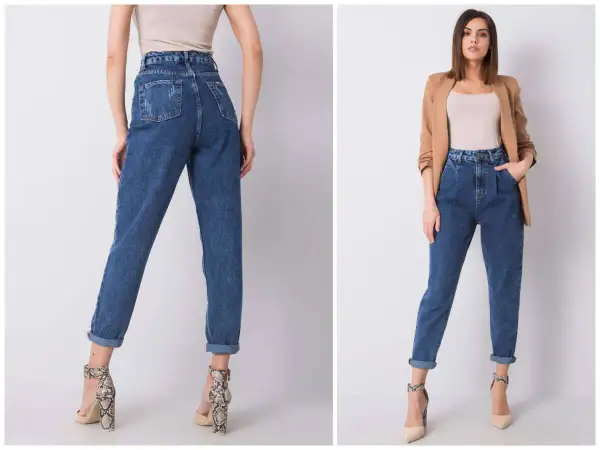 Kobieta w jeansach mom fit, które podkreślają talię i luźno opadają na nogi. To styl, który pokochały kobiety.