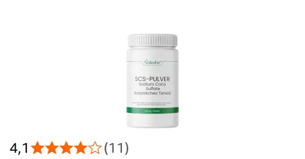 Biały pojemnik z zielonym logo Nakobe, zawierający proszek SCS-PULVER Sodium Coco Sulfate.